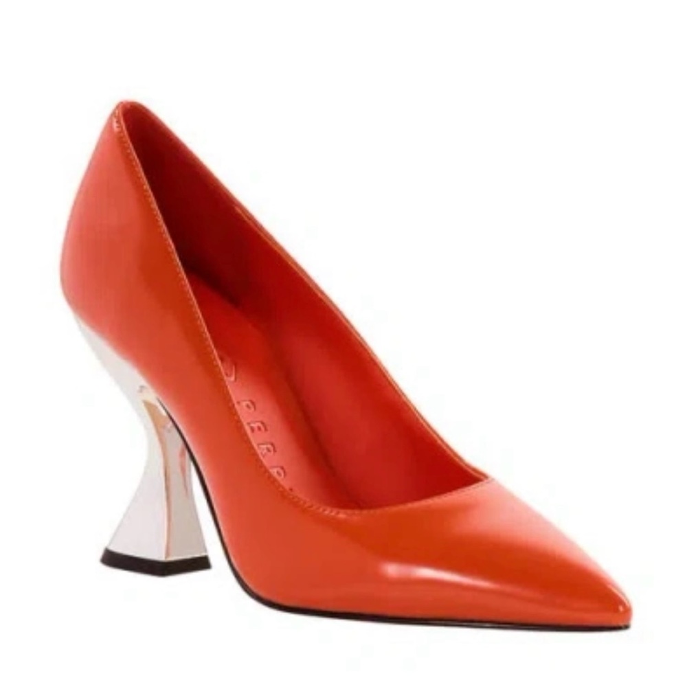 Katy Perry’s Chic Orange Women's Heels with Unique Silver Heel